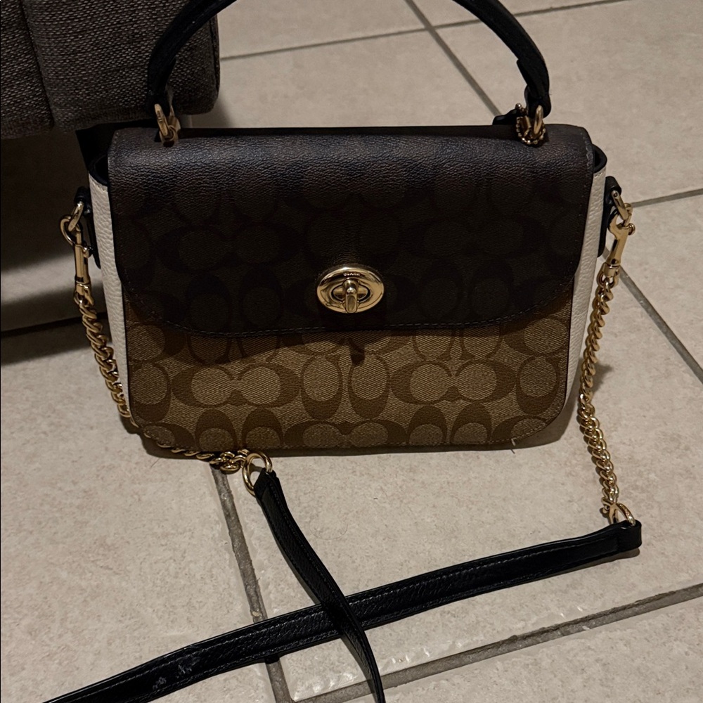 Coach Two-Tone Signature Turnlock Crossbody Bag in Brown and Black